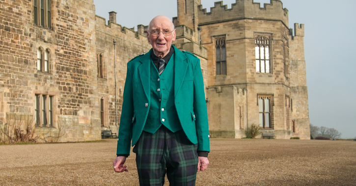 Jimmy Nicol stood outside with Raby Castle in background.